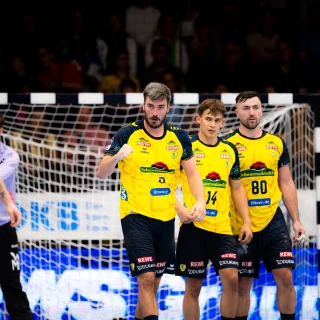 Lassen,Kohlbacher,Steenaerts in der Abwehr beim Göppingenspiel.