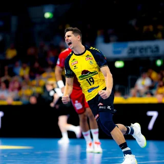 Marius Steinhauser beim Jubelschrei im Spiel gegen die MT Melsungen.