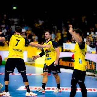 Robert Timmermeister, Dani Baijens und Jannik Kohlbacher im Spiel gegen die MT Melsungen.